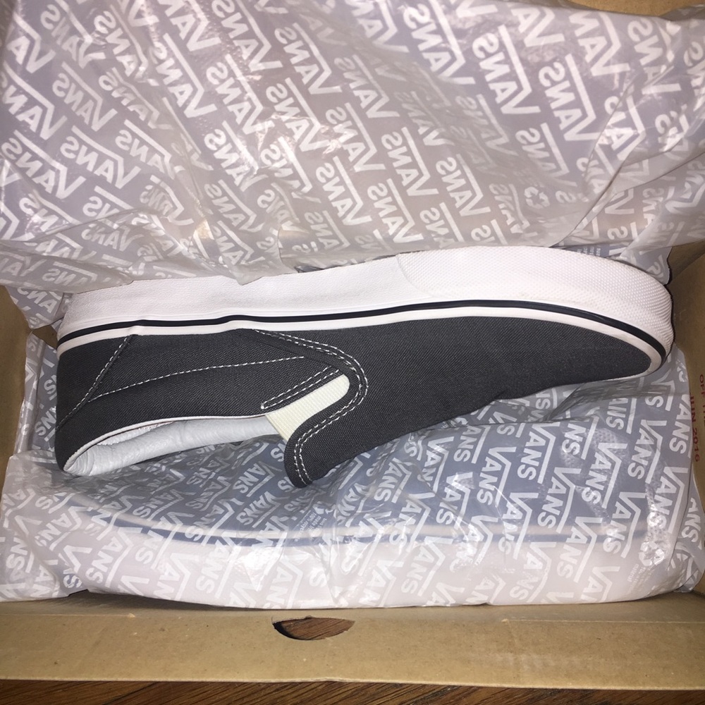 Grey slip on vans.